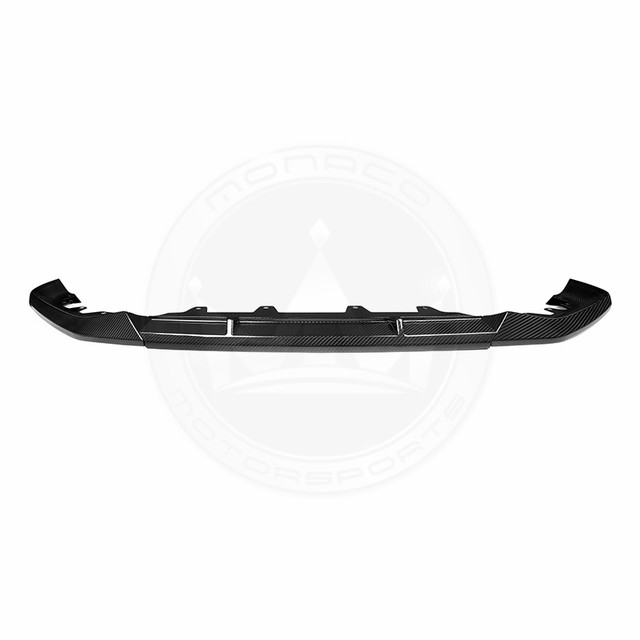 Black car front bumper lip splitter for aerodynamic enhancement.