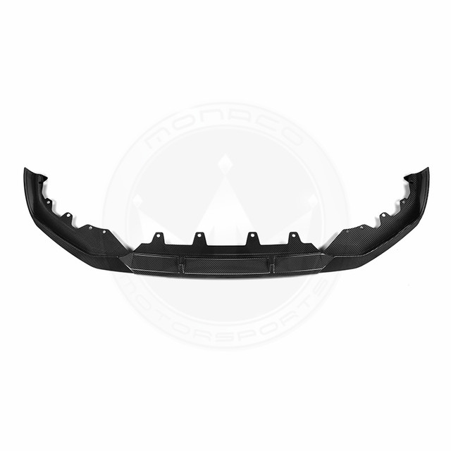 Black car bumper reinforcement bar isolated on white background.
