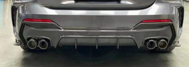 Close-up of a car's front grille and bumper area.